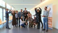Colleagues cooperating Excited group posing in various collaborative poses for camera